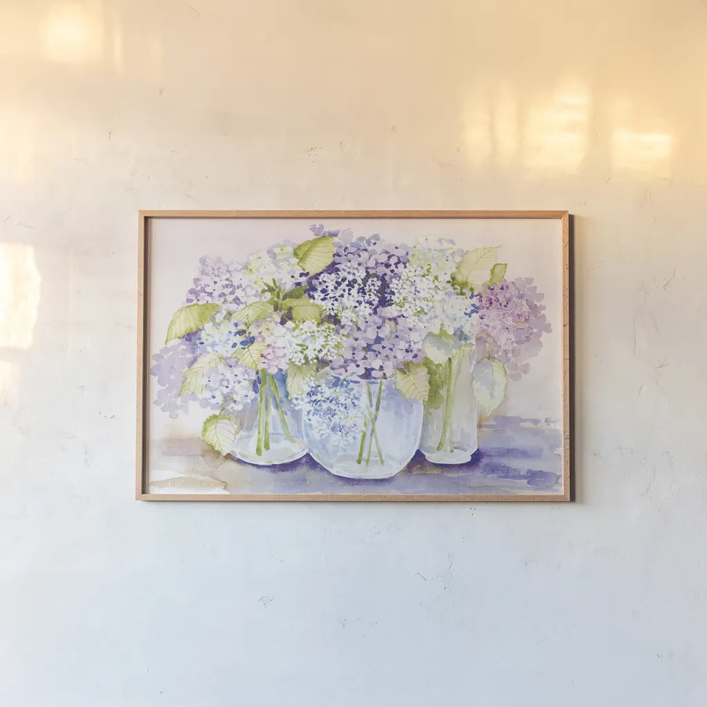 Hydrangeas in Glass Light by Kathleen Parr McKenna. shown as a paper print in a natural frame. Available as a archival giclee rolled canvas, fine art paper, or poster print. SKU 89987i.