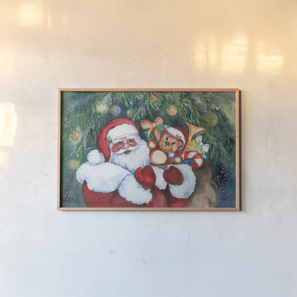 Jolly Santa by Kathleen Parr McKenna. shown as a paper print in a natural frame. Available as a archival giclee rolled canvas, fine art paper, or poster print. SKU 70545i.