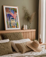 Patriotic Home by Kathleen Parr McKenna. shown as a paper print in a natural frame. Available as a archival giclee rolled canvas, fine art paper, or poster print. SKU 37265h.
