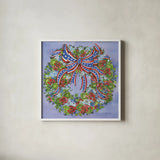 Patriotic Wreath by Kathleen Parr McKenna. Shown in a crisp white glass frame for a clean and minimalist style. Available as an archival giclee rolled canvas, fine art paper, or poster print. SKU 41291a.