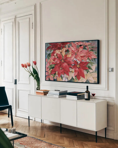 Poinsettia by Kathleen Parr McKenna. shown as a framed stretched canvas in a living room above a console. Available as a archival giclee rolled canvas, fine art paper, or poster print. SKU 80801i.