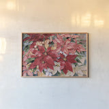 Poinsettia by Kathleen Parr McKenna. shown as a paper print in a natural frame. Available as a archival giclee rolled canvas, fine art paper, or poster print. SKU 80801i.