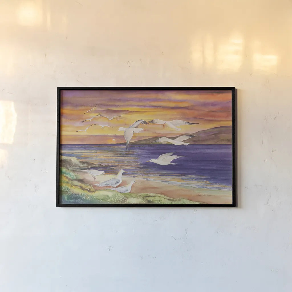 Seagull Sunset by Kathleen Parr McKenna. shown as a paper print in a black flame. Available as a archival giclee rolled canvas, fine art paper, or poster print. SKU 47973i.