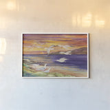 Seagull Sunset by Kathleen Parr McKenna. shown as a paper print in a white frame. Available as a archival giclee rolled canvas, fine art paper, or poster print. SKU 47973i.