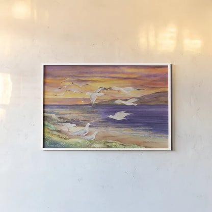 Seagull Sunset by Kathleen Parr McKenna. shown as a paper print in a white frame. Available as a archival giclee rolled canvas, fine art paper, or poster print. SKU 47973i.