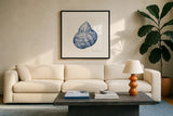 Shells IV Blue and White by Kathleen Parr McKenna. Displayed in a glass frame with matte in a clean modern living room. Available as an archival giclee rolled canvas, fine art paper, or poster print. SKU 40558a.