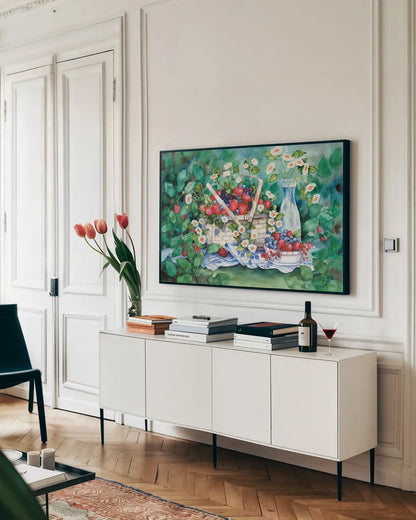 Strawberry Picnic by Kathleen Parr McKenna. shown as a framed stretched canvas in a living room above a console. Available as a archival giclee rolled canvas, fine art paper, or poster print. SKU 47970i.