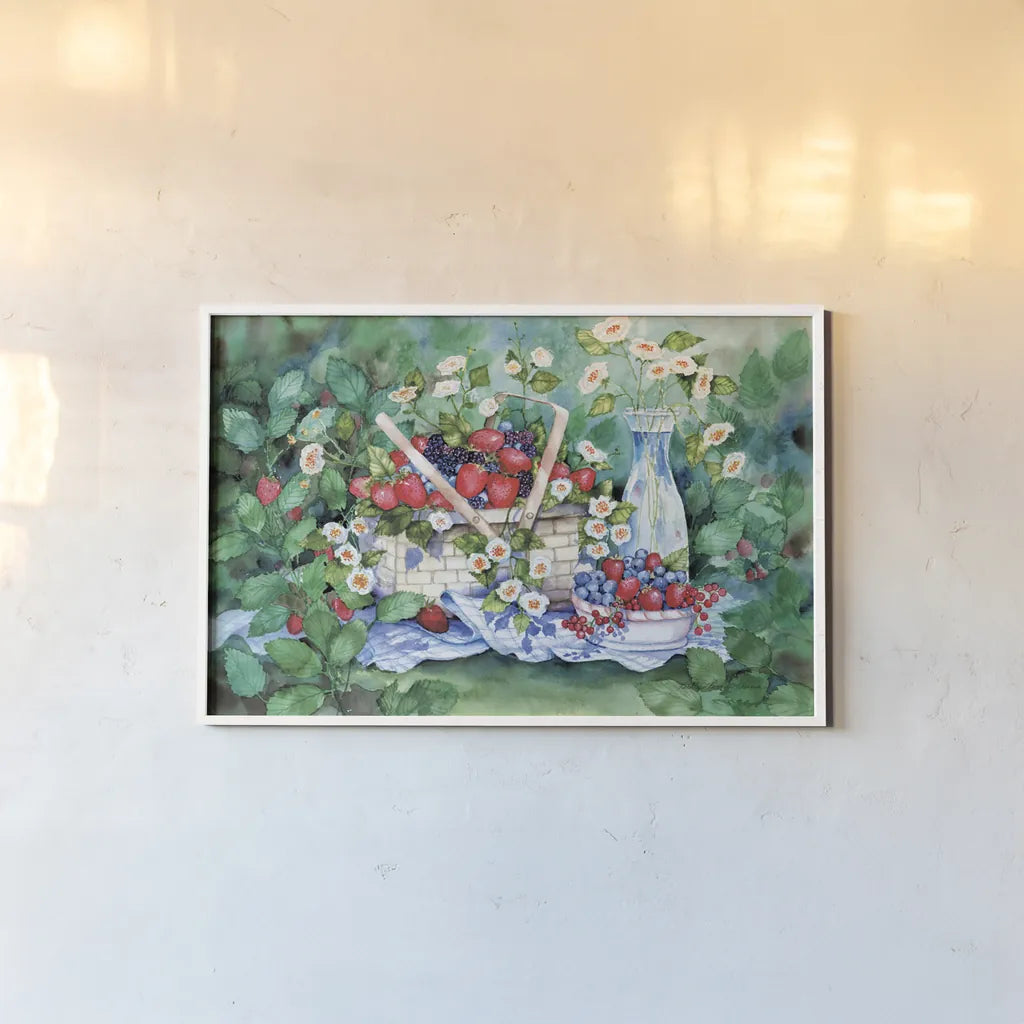 Strawberry Picnic by Kathleen Parr McKenna. shown as a paper print in a white frame. Available as a archival giclee rolled canvas, fine art paper, or poster print. SKU 47970i.