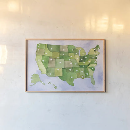 USA Capital Map by Kathleen Parr McKenna. shown as a paper print in a natural frame. Available as a archival giclee rolled canvas, fine art paper, or poster print. SKU 53450i.