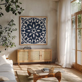 Blue and White Tile III by Kathrine Lovell. Shown in a natural wood frame in a cozy modern living room. Available as an archival giclee rolled canvas, fine art paper, or poster print. SKU 59160a.