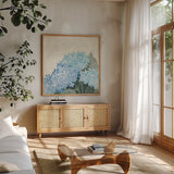 Decorative Hydrangea III Providence by Kathrine Lovell. Shown in a natural wood frame in a cozy modern living room. Available as an archival giclee rolled canvas, fine art paper, or poster print. SKU 82164a.