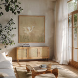Egret Alighting I Neutral by Kathrine Lovell. Shown in a natural wood frame in a cozy modern living room. Available as an archival giclee rolled canvas, fine art paper, or poster print. SKU 73913a.