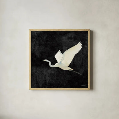 Egret Alighting II Flipped Black by Kathrine Lovell. Shown in a natural wood glass frame for a timeless modern aesthetic. Available as an archival giclee rolled canvas, fine art paper, or poster print. SKU 79055a.
