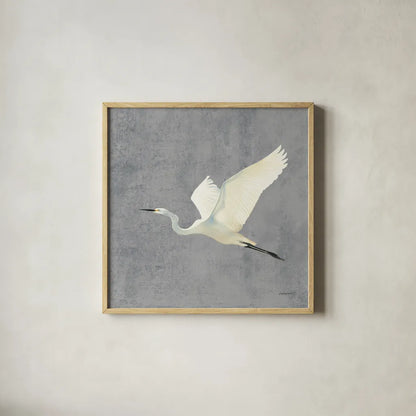 Egret Alighting II Flipped Gray No Grass by Kathrine Lovell. Shown in a natural wood glass frame for a timeless modern aesthetic. Available as an archival giclee rolled canvas, fine art paper, or poster print. SKU 82835a.