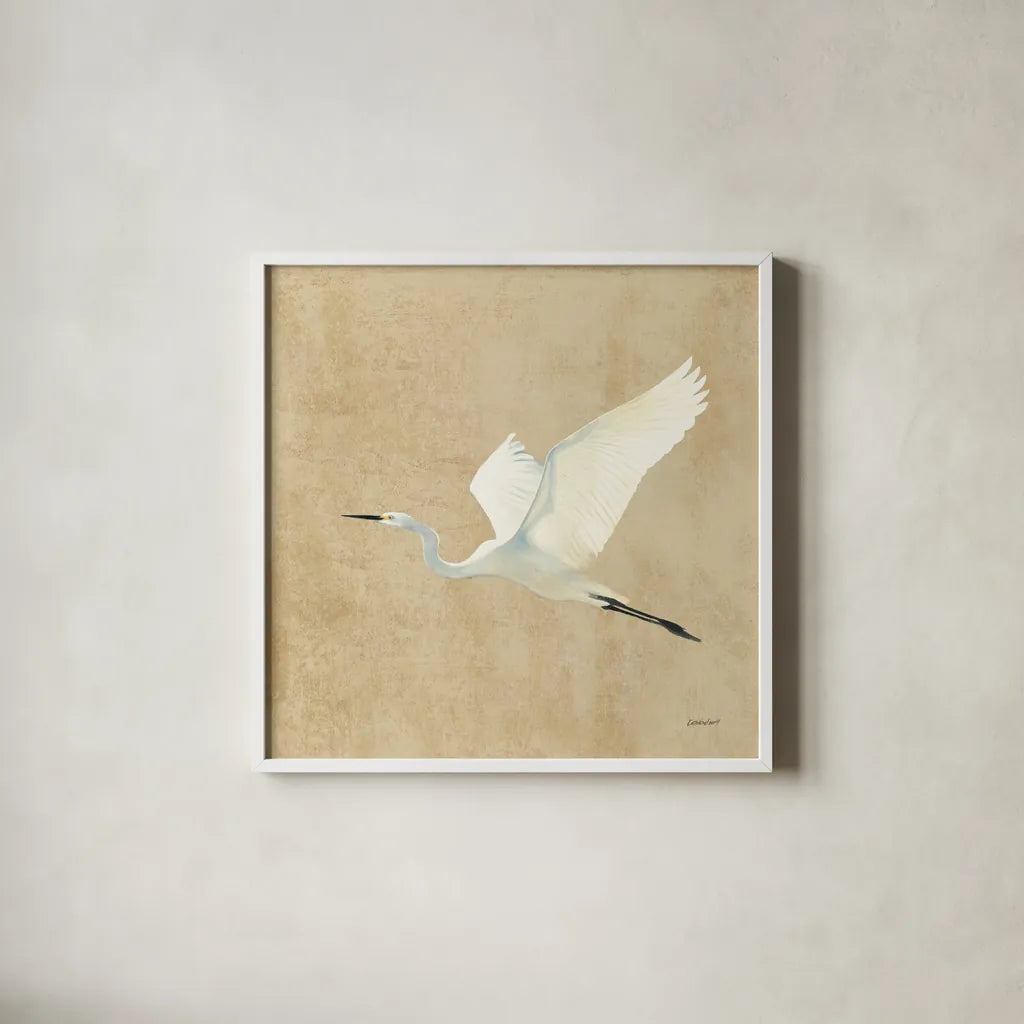 Egret Alighting II Flipped Neutral No Grass by Kathrine Lovell. Shown in a crisp white glass frame for a clean and minimalist style. Available as an archival giclee rolled canvas, fine art paper, or poster print. SKU 82834a.