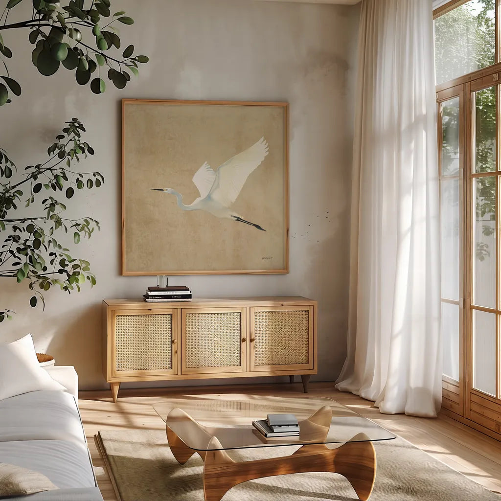 Egret Alighting II Flipped Neutral No Grass by Kathrine Lovell. Shown in a natural wood frame in a cozy modern living room. Available as an archival giclee rolled canvas, fine art paper, or poster print. SKU 82834a.
