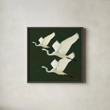 Egrets Alighting II on Green by Kathrine Lovell. Shown in a sleek black glass frame for a contemporary gallery look. Available as an archival giclee rolled canvas, fine art paper, or poster print. SKU 86426a.