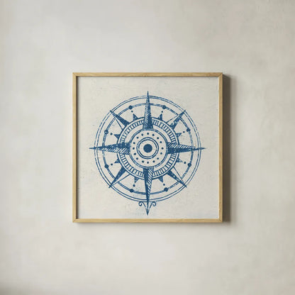 Indigo Gild Compass Rose 1 by Kathrine Lovell. Shown in a natural wood glass frame for a timeless modern aesthetic. Available as an archival giclee rolled canvas, fine art paper, or poster print. SKU 27150a.