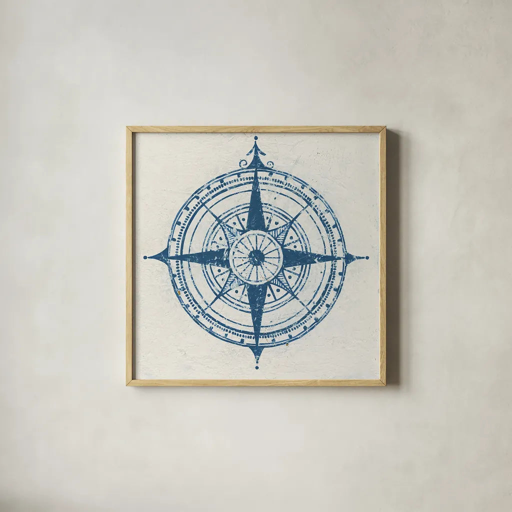 Indigo Gild Compass Rose 2 by Kathrine Lovell. Shown in a natural wood glass frame for a timeless modern aesthetic. Available as an archival giclee rolled canvas, fine art paper, or poster print. SKU 27151a.
