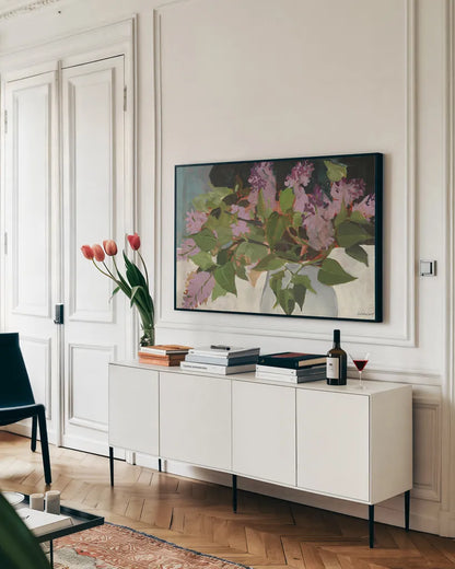 June Lilacs by Kathrine Lovell. shown as a framed stretched canvas in a living room above a console. Available as a archival giclee rolled canvas, fine art paper, or poster print. SKU 42556i.