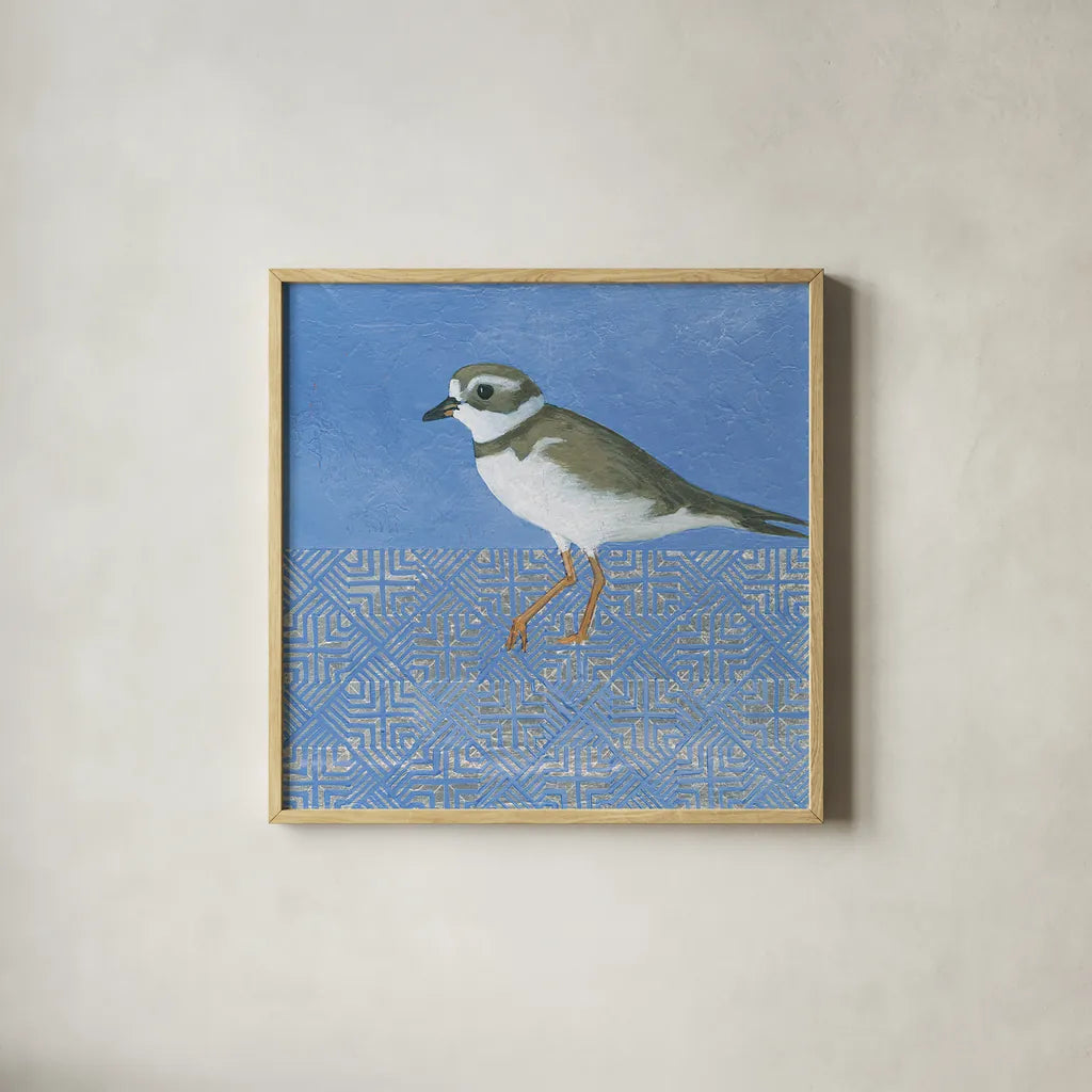 Plover by Kathrine Lovell. Shown in a natural wood glass frame for a timeless modern aesthetic. Available as an archival giclee rolled canvas, fine art paper, or poster print. SKU 28683a.
