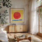 Primary Sunrise I by Kathrine Lovell. Shown in a natural wood frame in a cozy modern living room. Available as an archival giclee rolled canvas, fine art paper, or poster print. SKU 84780a.
