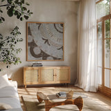 Silver Lakai Circle II Square IV by Kathrine Lovell. Shown in a natural wood frame in a cozy modern living room. Available as an archival giclee rolled canvas, fine art paper, or poster print. SKU 28014a.