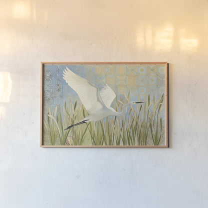 Snowy Egret in Flight by Kathrine Lovell. shown as a paper print in a natural frame. Available as a archival giclee rolled canvas, fine art paper, or poster print. SKU 29660i.