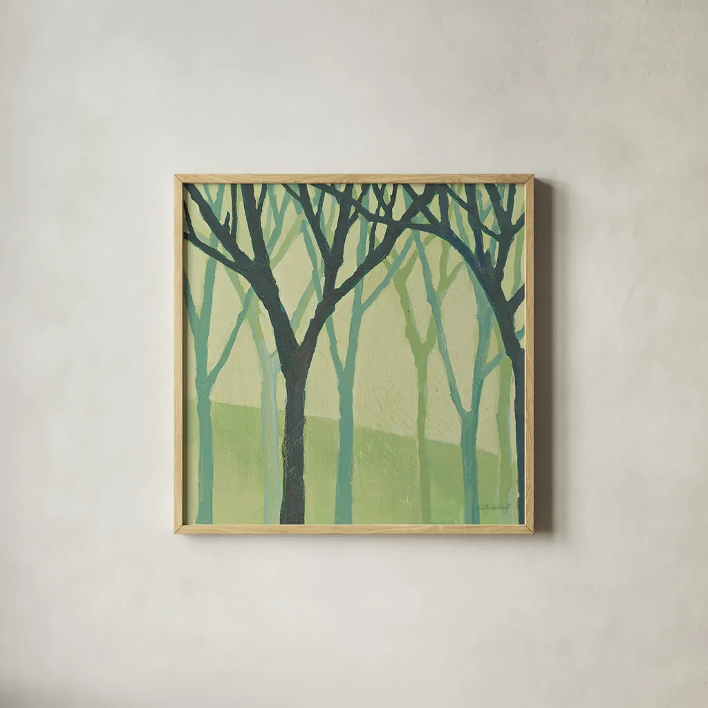 Spring Trees Green I by Kathrine Lovell. Shown in a natural wood glass frame for a timeless modern aesthetic. Available as an archival giclee rolled canvas, fine art paper, or poster print. SKU 43459a.