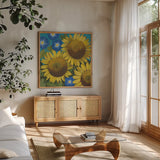 Sunflower Time by Kathrine Lovell. Shown in a natural wood frame in a cozy modern living room. Available as an archival giclee rolled canvas, fine art paper, or poster print. SKU 24412a.