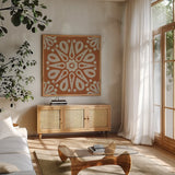 Terra Cotta Tile I by Kathrine Lovell. Shown in a natural wood frame in a cozy modern living room. Available as an archival giclee rolled canvas, fine art paper, or poster print. SKU 55517a.