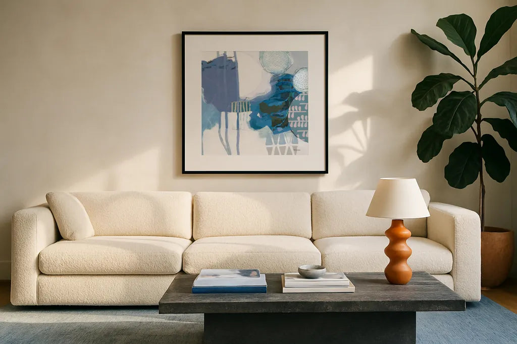 Abstract Layers IV Blue by Kathy Ferguson. Displayed in a glass frame with matte in a clean modern living room. Available as an archival giclee rolled canvas, fine art paper, or poster print. SKU 72695a.