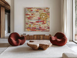 EU Timetable I Red by Kathy Ferguson. Shown as extra-large giant wall art in a modern living room. Available as an archival giclee rolled canvas, fine art paper, or poster print. SKU 55989a.