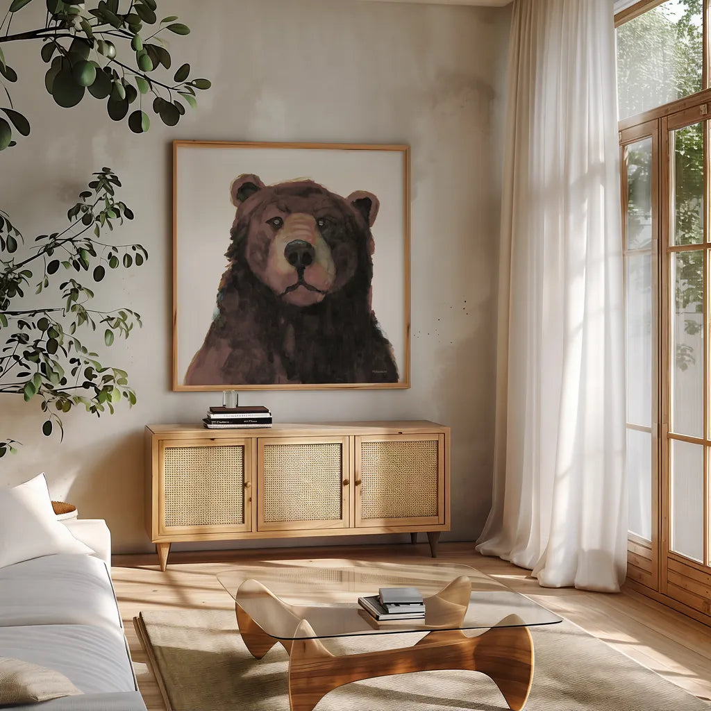 Friendly Bear Brown by Kathy Ferguson. Shown in a natural wood frame in a cozy modern living room. Available as an archival giclee rolled canvas, fine art paper, or poster print. SKU 86925a.