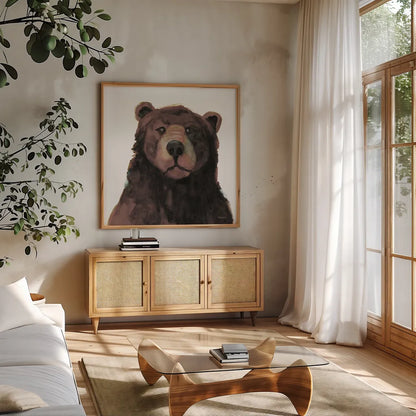 Friendly Bear Brown by Kathy Ferguson. Shown in a natural wood frame in a cozy modern living room. Available as an archival giclee rolled canvas, fine art paper, or poster print. SKU 86925a.