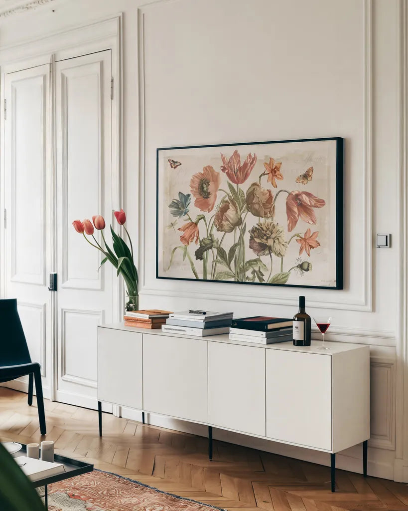 Antiquarian Blooms II by Katie Pertiet. shown as a framed stretched canvas in a living room above a console. Available as a archival giclee rolled canvas, fine art paper, or poster print. SKU 62241i.