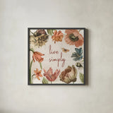 Antiquarian Blooms VII by Katie Pertiet. Shown in a sleek black glass frame for a contemporary gallery look. Available as an archival giclee rolled canvas, fine art paper, or poster print. SKU 62246a.