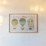 Balloon Expo I by Katie Pertiet. shown as a paper print in a natural frame. Available as a archival giclee rolled canvas, fine art paper, or poster print. SKU 31408i.