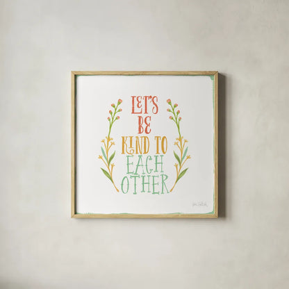 Be Kind I White by Katie Pertiet. Shown in a natural wood glass frame for a timeless modern aesthetic. Available as an archival giclee rolled canvas, fine art paper, or poster print. SKU 52884a.