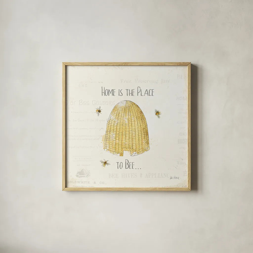Bee and Bee II by Katie Pertiet. Shown in a natural wood glass frame for a timeless modern aesthetic. Available as an archival giclee rolled canvas, fine art paper, or poster print. SKU 27324a.