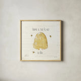 Bee and Bee II by Katie Pertiet. Shown in a natural wood glass frame for a timeless modern aesthetic. Available as an archival giclee rolled canvas, fine art paper, or poster print. SKU 27324a.