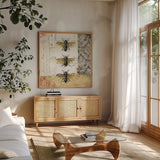 Bees n Butterflies No 1 by Katie Pertiet. Shown in a natural wood frame in a cozy modern living room. Available as an archival giclee rolled canvas, fine art paper, or poster print. SKU 52909a.