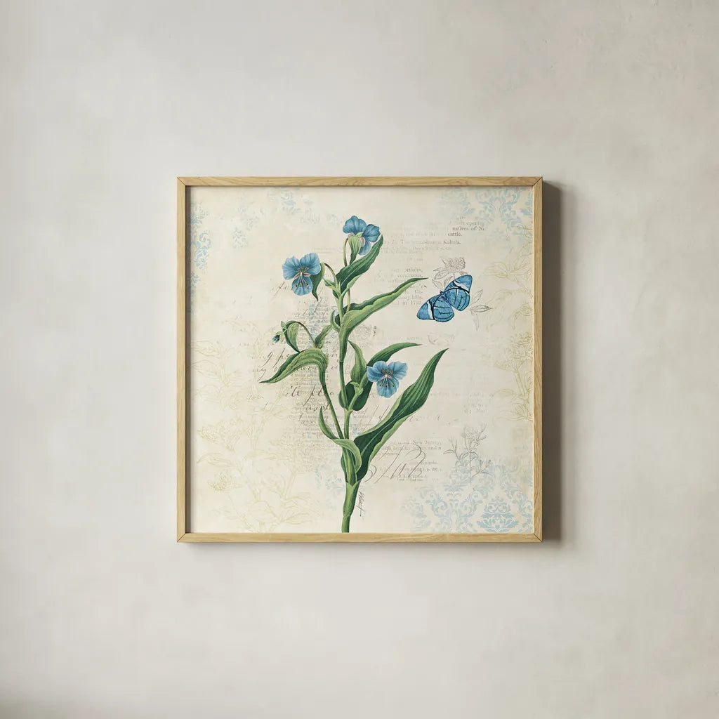 Booked Blue I by Katie Pertiet. Shown in a natural wood glass frame for a timeless modern aesthetic. Available as an archival giclee rolled canvas, fine art paper, or poster print. SKU 16818a.