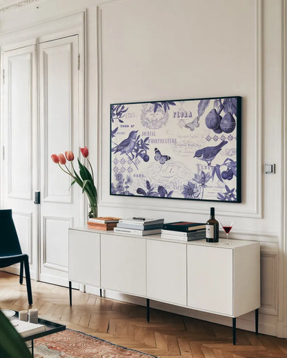 Botanical Blue I by Katie Pertiet. shown as a framed stretched canvas in a living room above a console. Available as a archival giclee rolled canvas, fine art paper, or poster print. SKU 42172i.