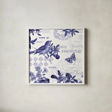 Botanical Blue II by Katie Pertiet. Shown in a crisp white glass frame for a clean and minimalist style. Available as an archival giclee rolled canvas, fine art paper, or poster print. SKU 42173a.