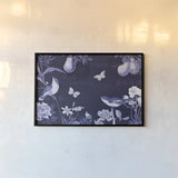 Botanical Blue IV by Katie Pertiet. shown as a paper print in a black flame. Available as a archival giclee rolled canvas, fine art paper, or poster print. SKU 42175i.