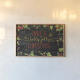 Christmas Sentiments I Black by Katie Pertiet. shown as a paper print in a natural frame. Available as a archival giclee rolled canvas, fine art paper, or poster print. SKU 32393i.