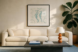 Coastal Splash III by Katie Pertiet. Displayed in a glass frame with matte in a clean modern living room. Available as an archival giclee rolled canvas, fine art paper, or poster print. SKU 25965a.