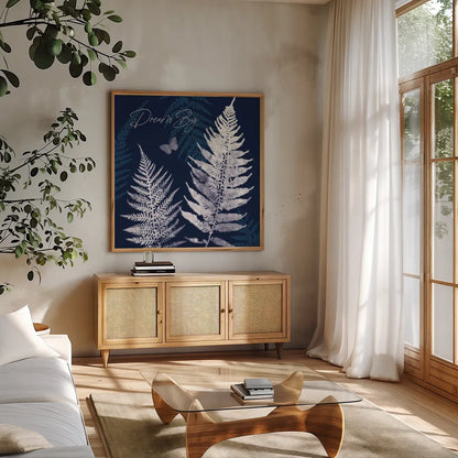 Dark True Blue VI by Katie Pertiet. Shown in a natural wood frame in a cozy modern living room. Available as an archival giclee rolled canvas, fine art paper, or poster print. SKU 66620a.