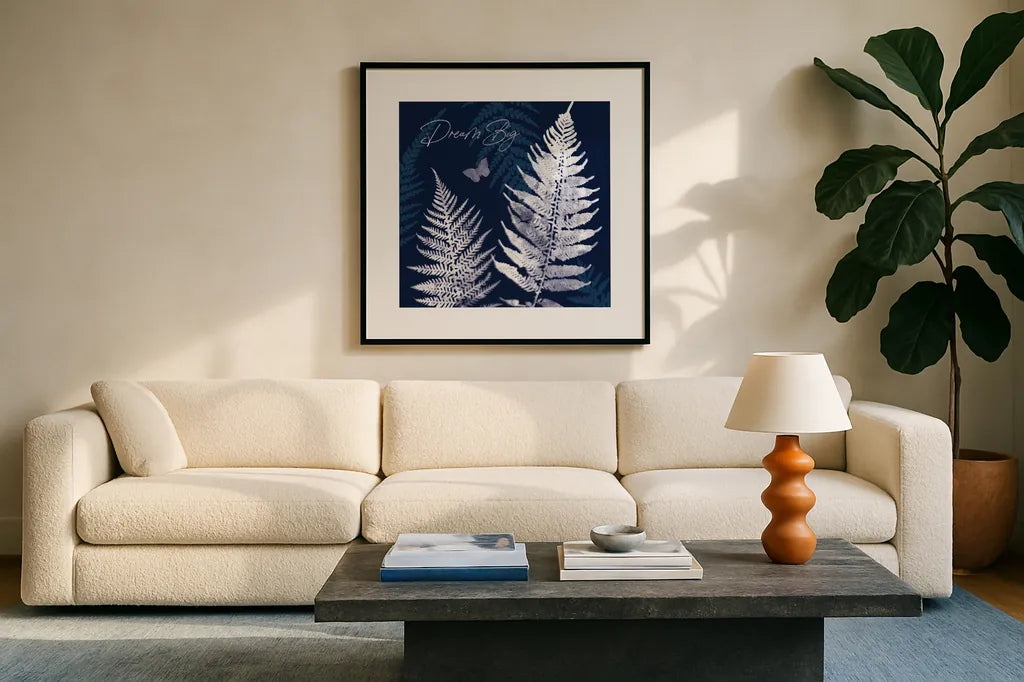 Dark True Blue VI by Katie Pertiet. Displayed in a glass frame with matte in a clean modern living room. Available as an archival giclee rolled canvas, fine art paper, or poster print. SKU 66620a.